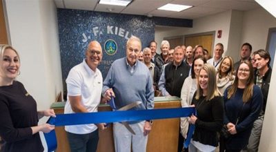 ribbon-cutting CEO John M. Kiely (left) and Chairman John F. Kiely Cutting the Grand Re-Opening Ribbon at 700 McClellan Street in Long Branch, New Jersey