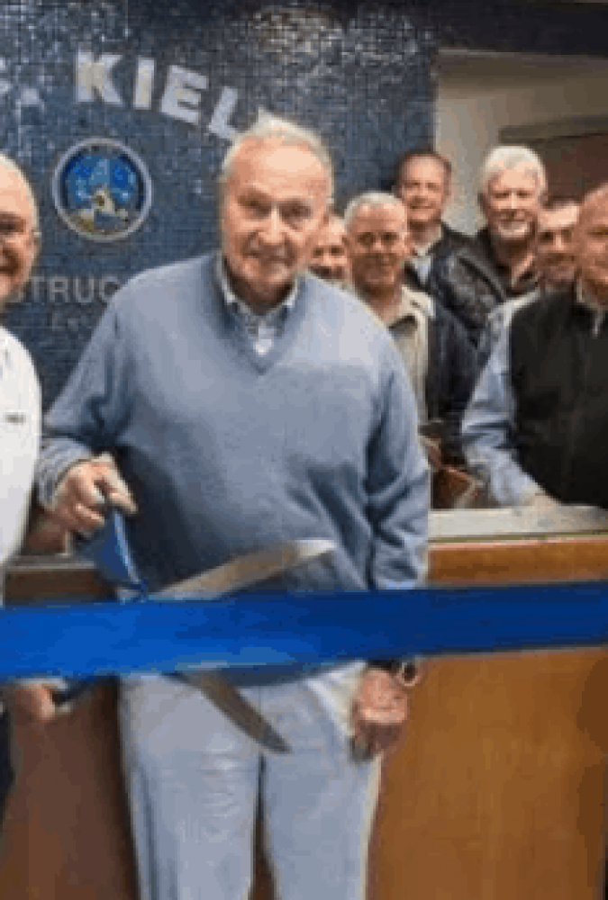 Kiely CEO John M. Kiely (left) and Chairman John F. Kiely Cutting the Grand Re-Opening Ribbon at 700 McClellan Street in Long Branch, New Jersey